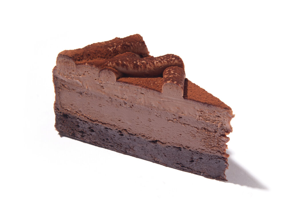 A slice of Eli's Double Chocolate Cheesecake made with Ghirardelli