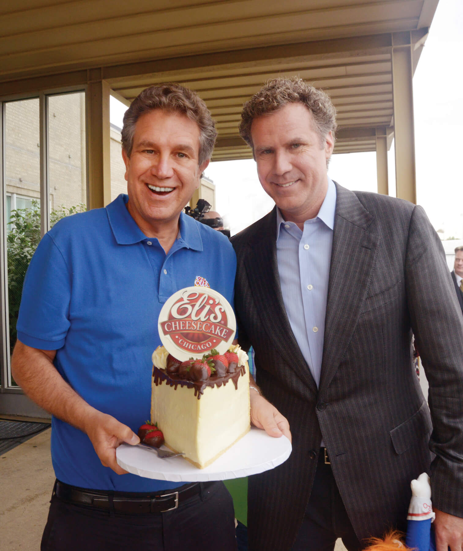 Will Farrell and Marc Schulman with an Eli's Cheesecake