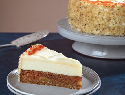 A slice of Carrot Cake Cheesecake