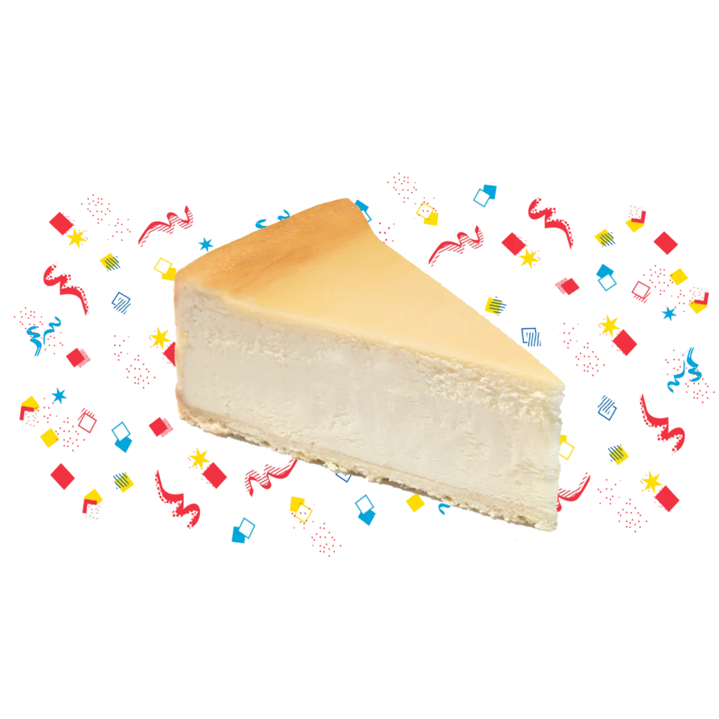 a slice of cheesecake with confetti in the background
