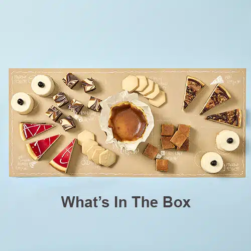 A cheesecake board with cheesecakes of many different shapes and sizes