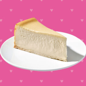 A slice of Original Plain cheesecake with a Valentine's Day background