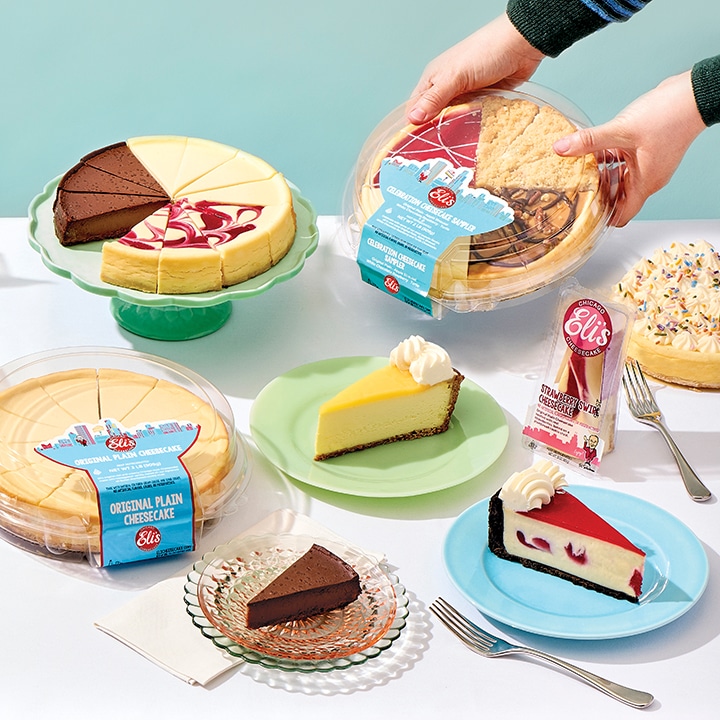 A variety of Eli's Cheesecakes on a table
